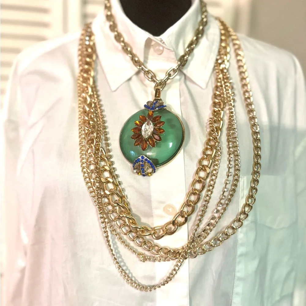 Gold multi chain belt with rhinestone strand of chain
